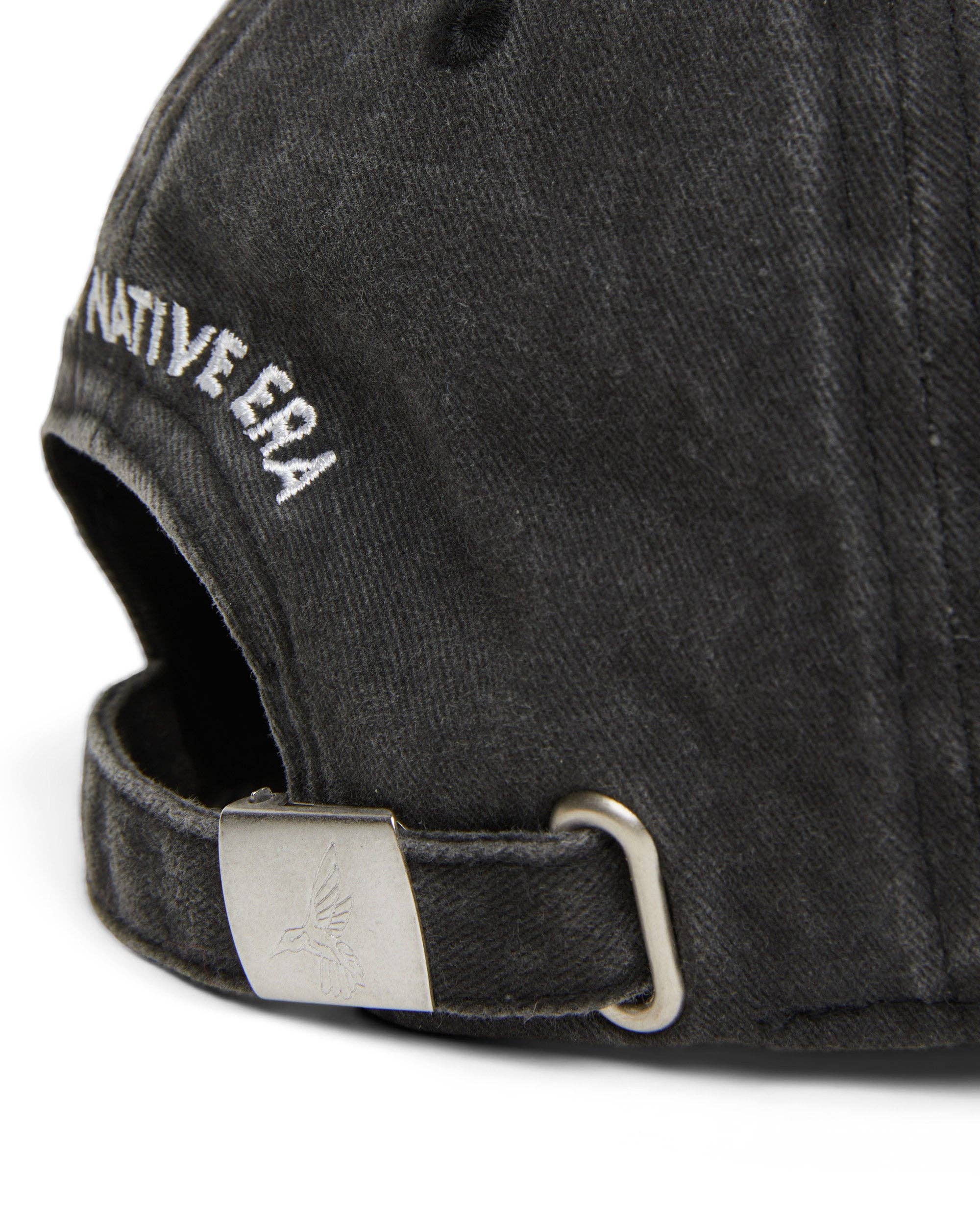 Black cap with 'URBAN NATIVE ERA' branding on a white background