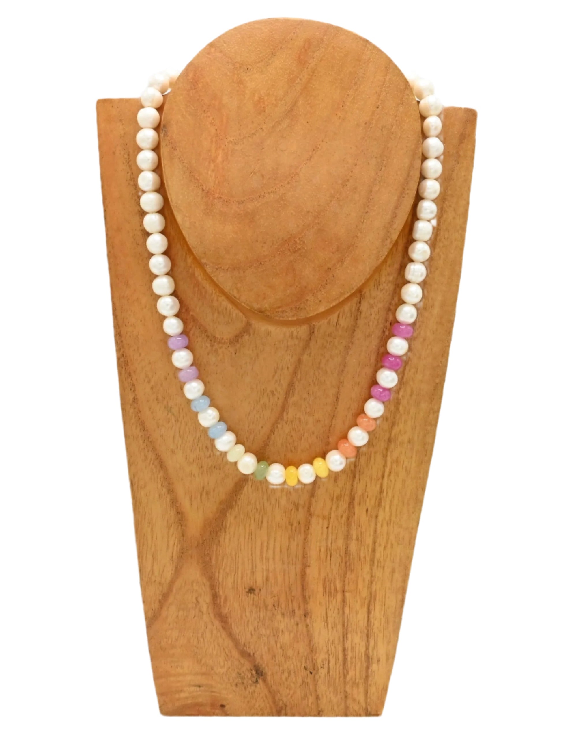 Necklace with multicolored beads on a wooden stand against a white background