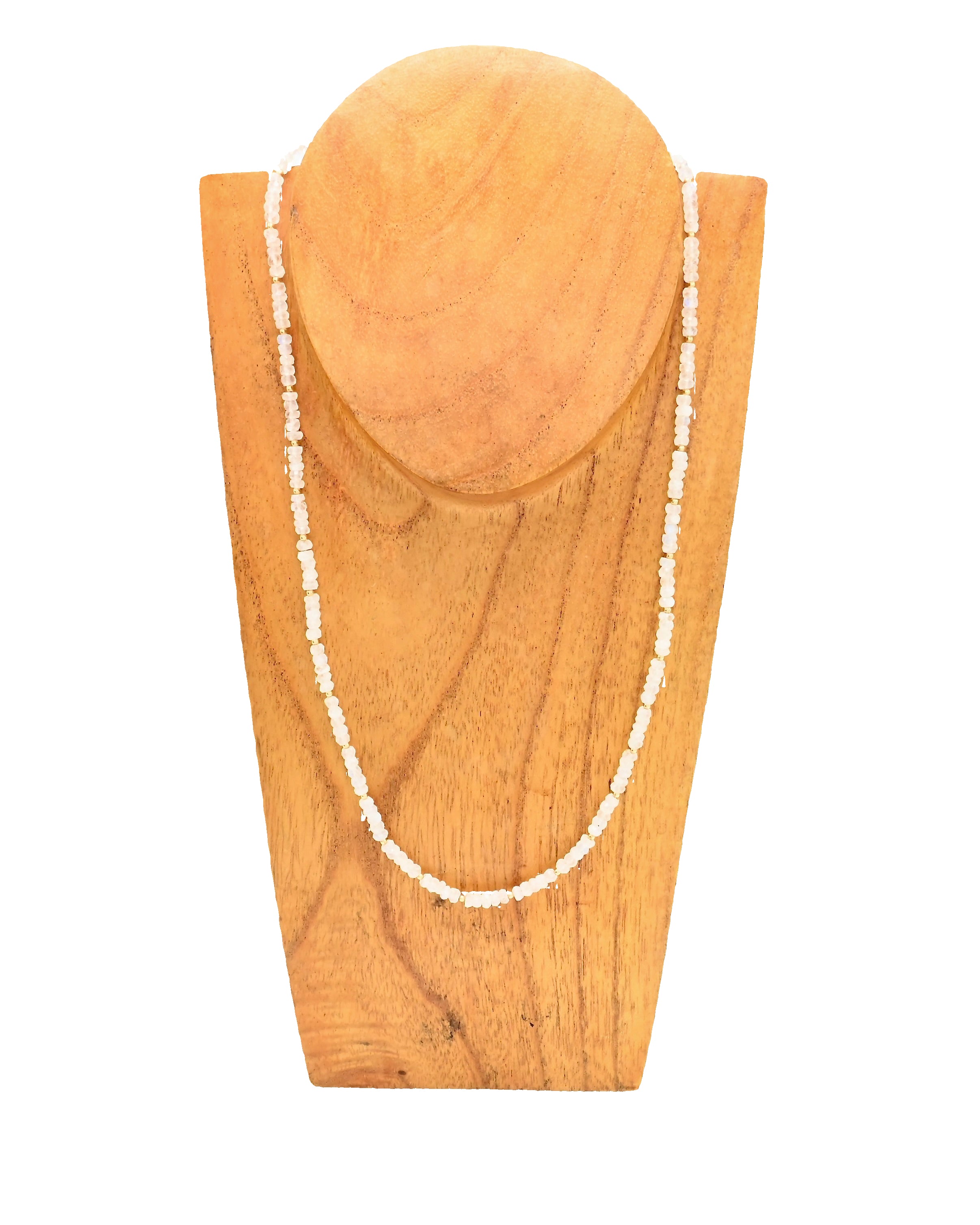 Necklace on a wooden stand with a plain background