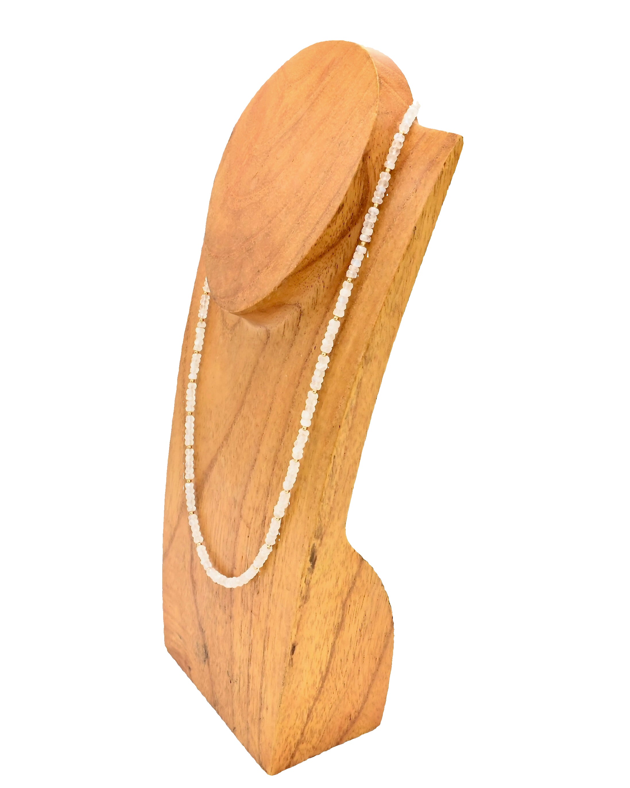 Wooden jewelry display holding a necklace on a white background
