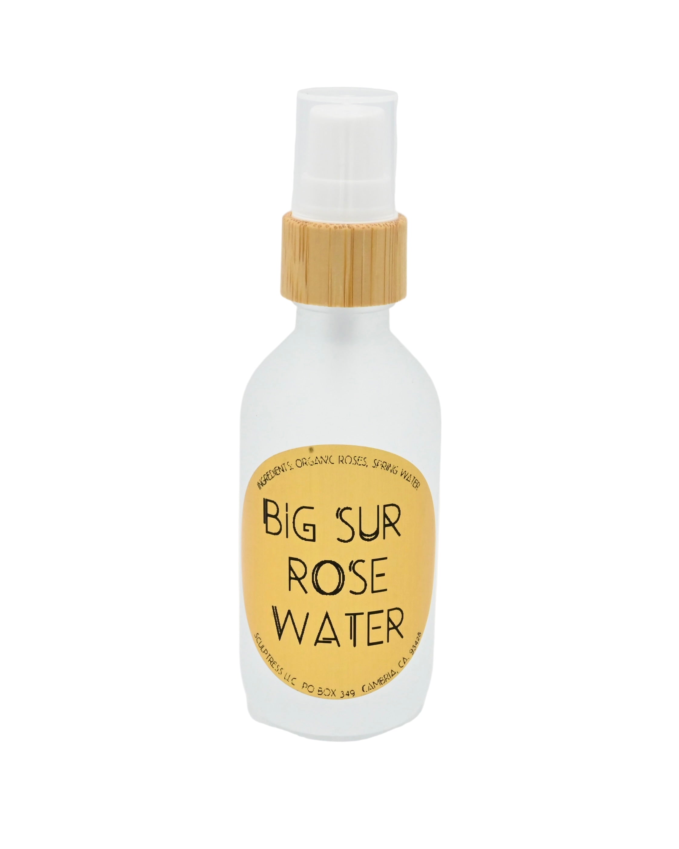 Bottle of Big Sur Rose Water with a bamboo cap on a white background