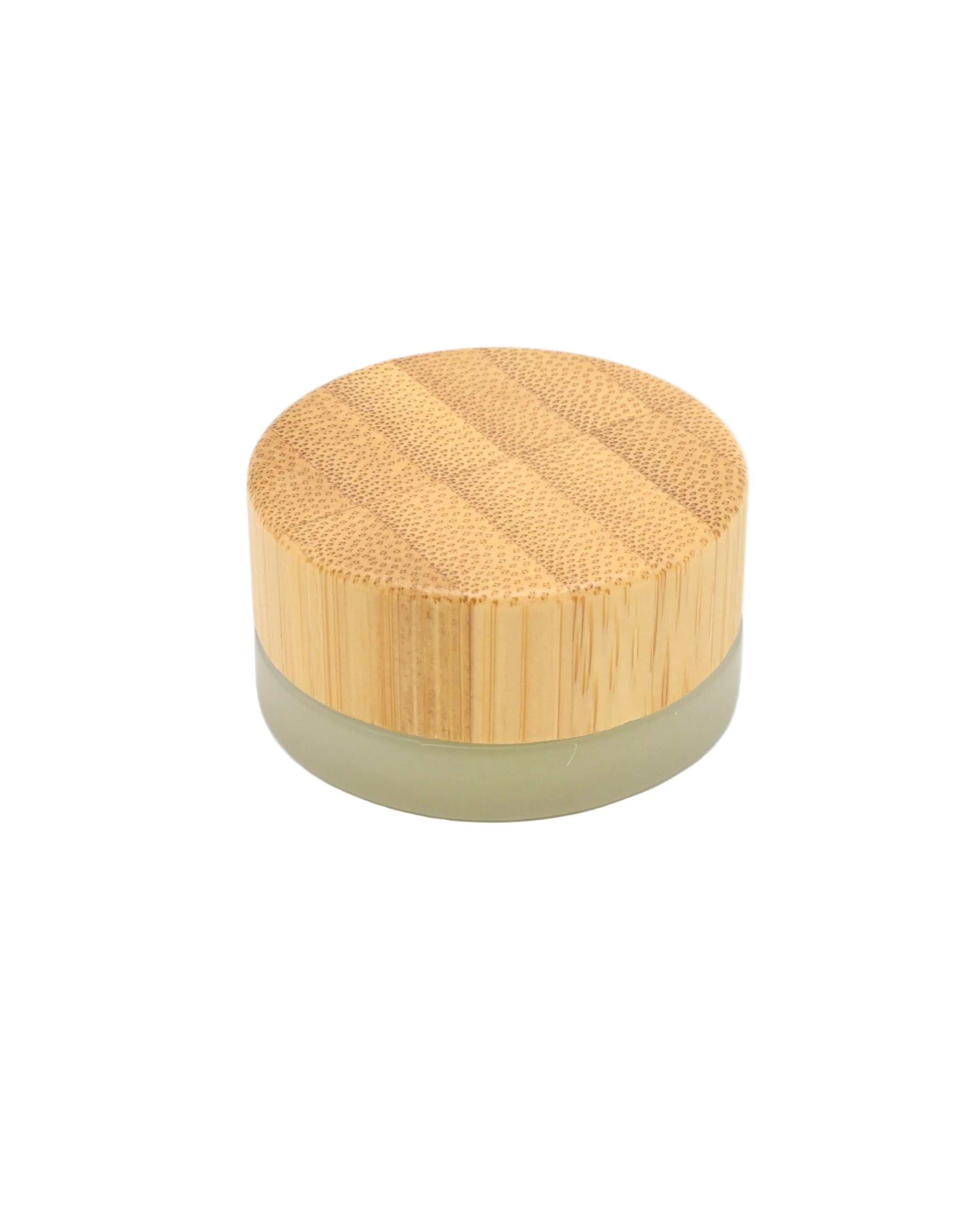 Big Sur beauty balm - Round container with a bamboo lid on a white background