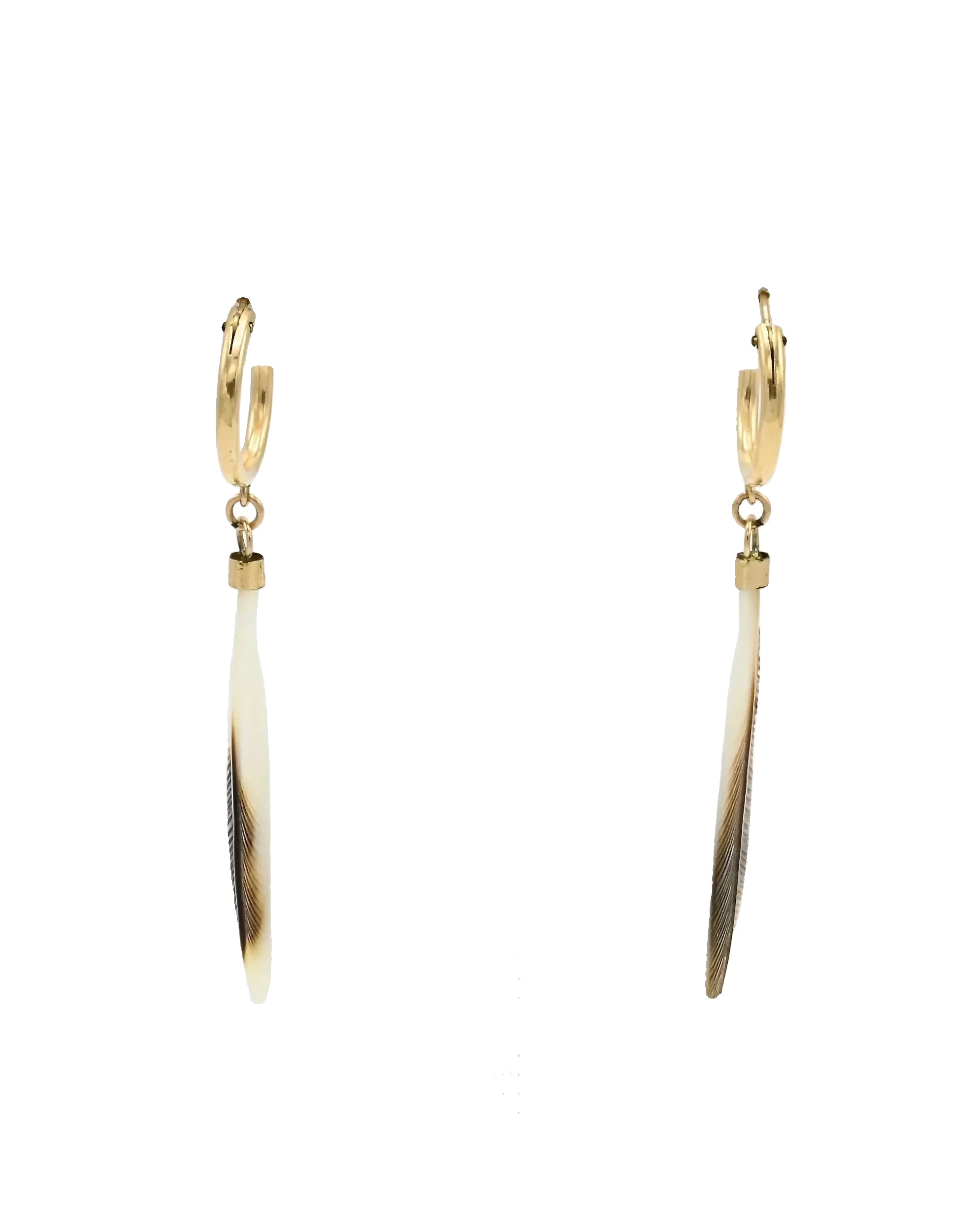 A pair of gold hoop earrings with long, feather-like drop pendants in white and black, displayed on a white T-stand against a white background.