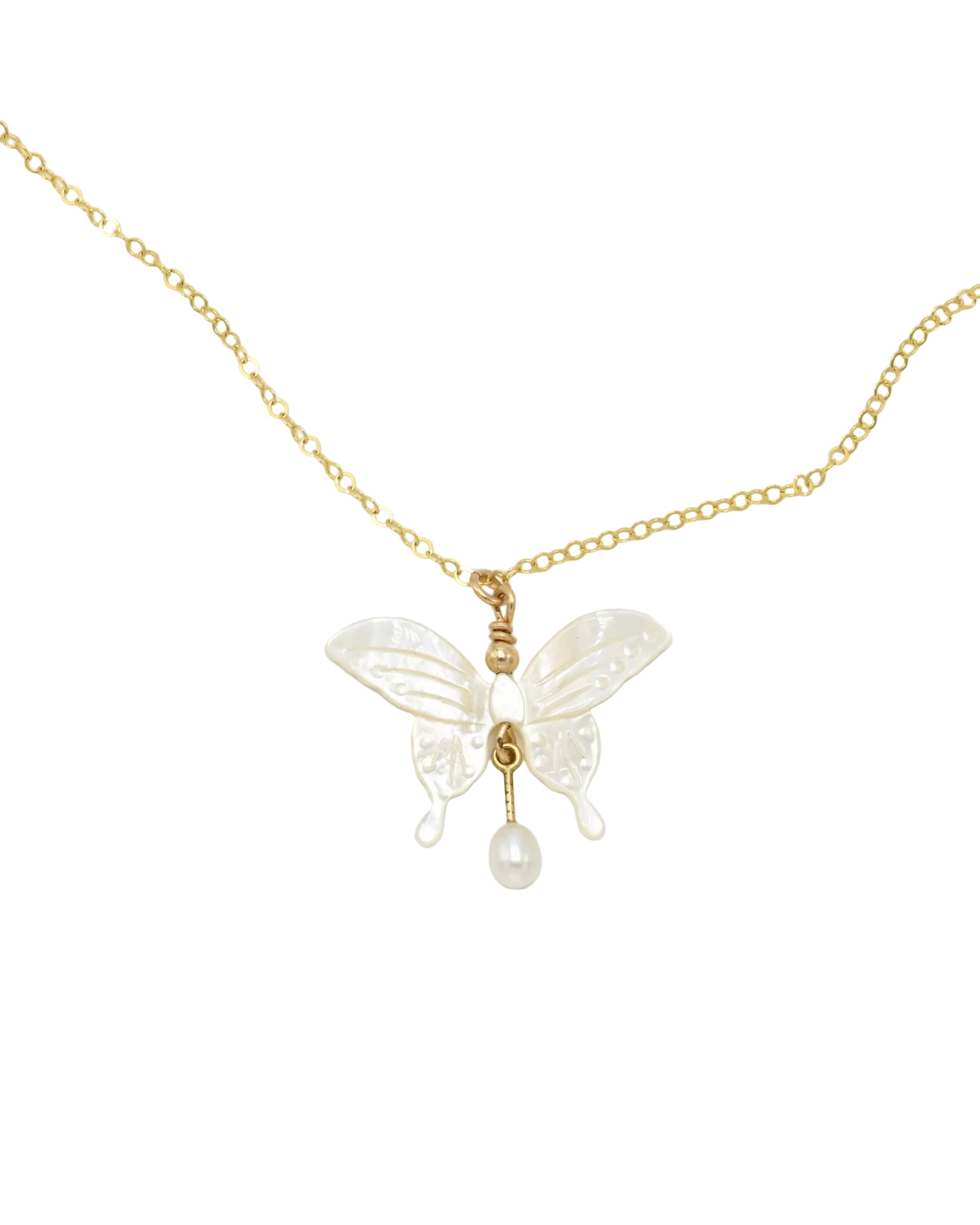 A delicate gold chain necklace featuring a butterfly pendant crafted from textured white mother-of-pearl, with a small white pearl drop hanging from the center, set against a plain light gray background.