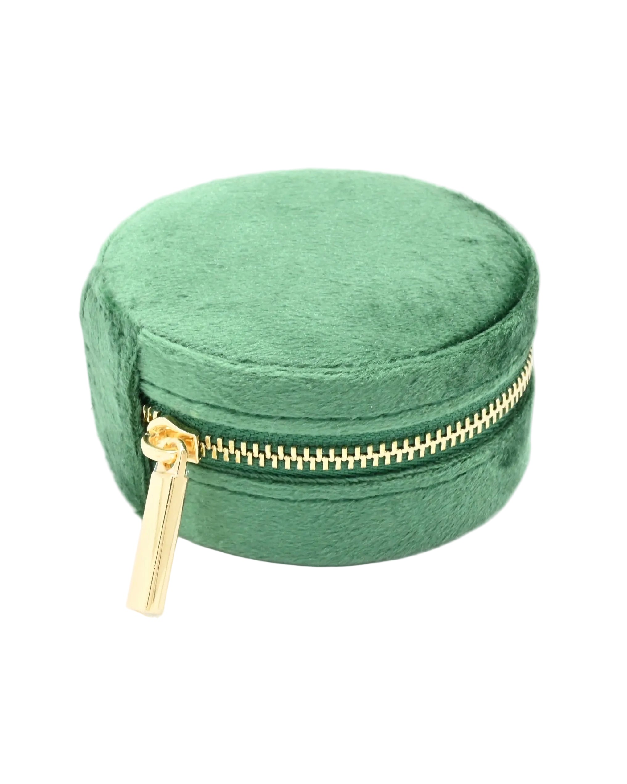Green round velvet jewelry box with a gold zipper on a white background