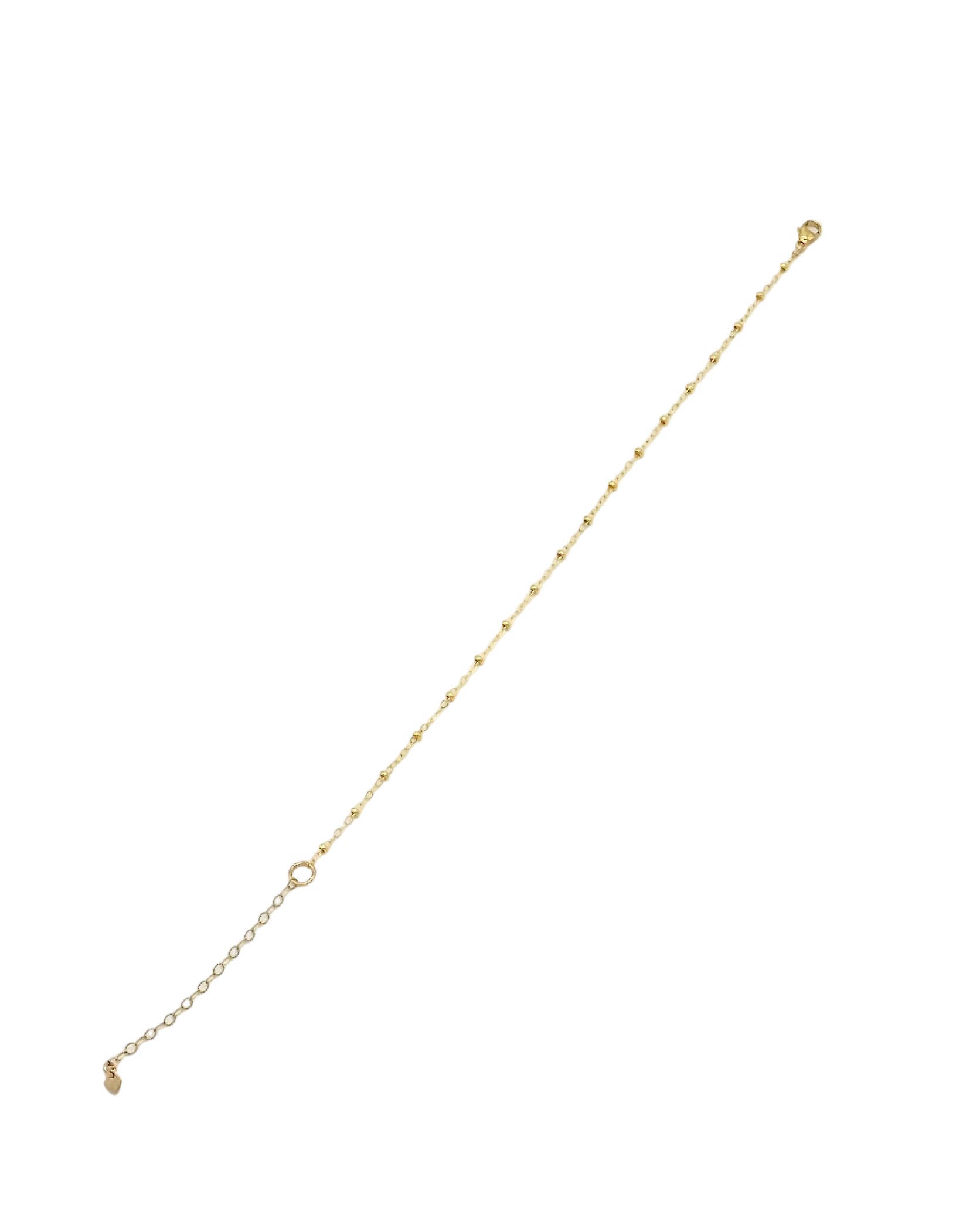 A delicate gold chain bracelet with a small circular connector and extender chain, shown on a plain white background.