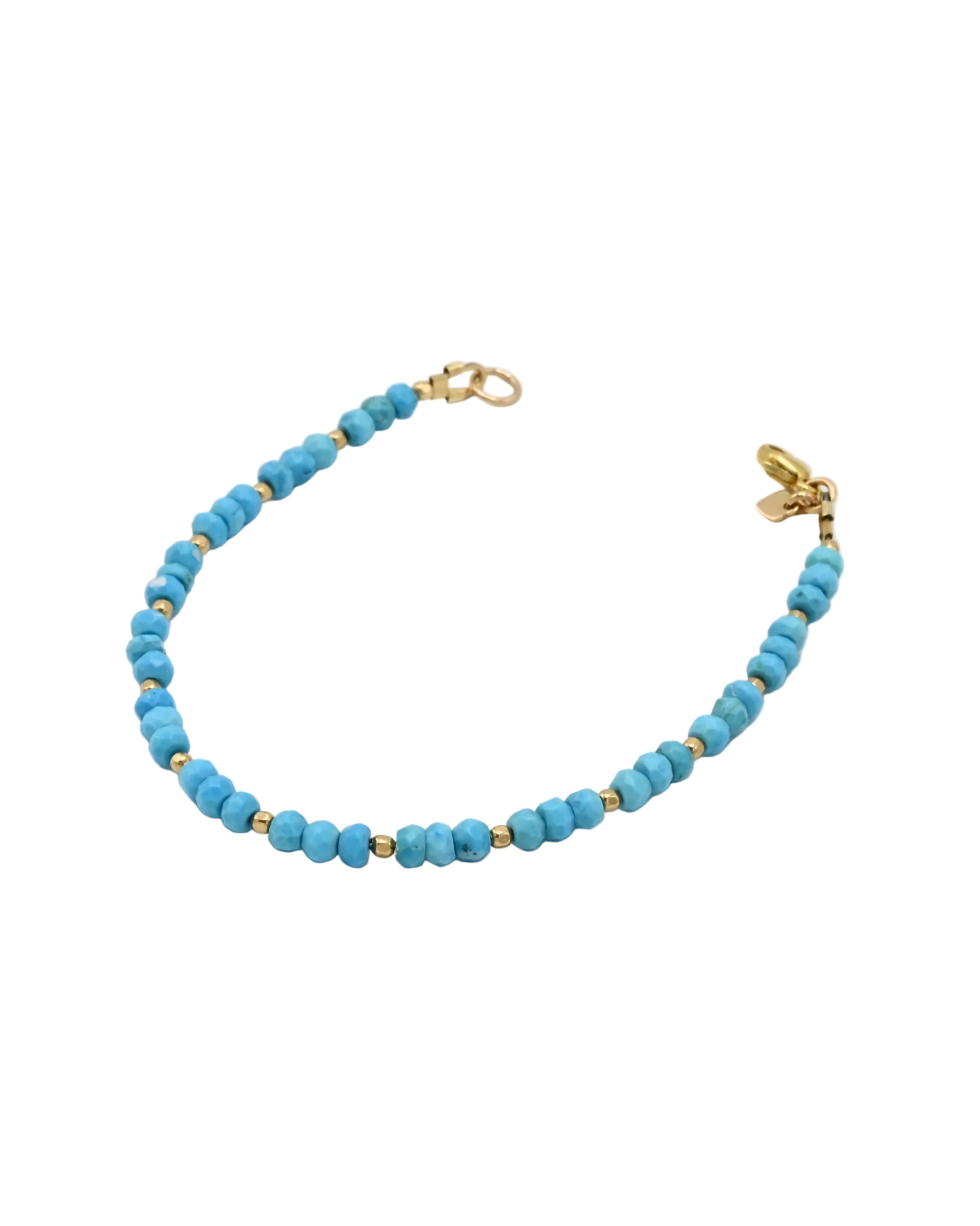 A beaded bracelet featuring light blue turquoise round beads separated by small gold spacer beads, finished with gold-tone clasp hardware, shown on a plain white background.