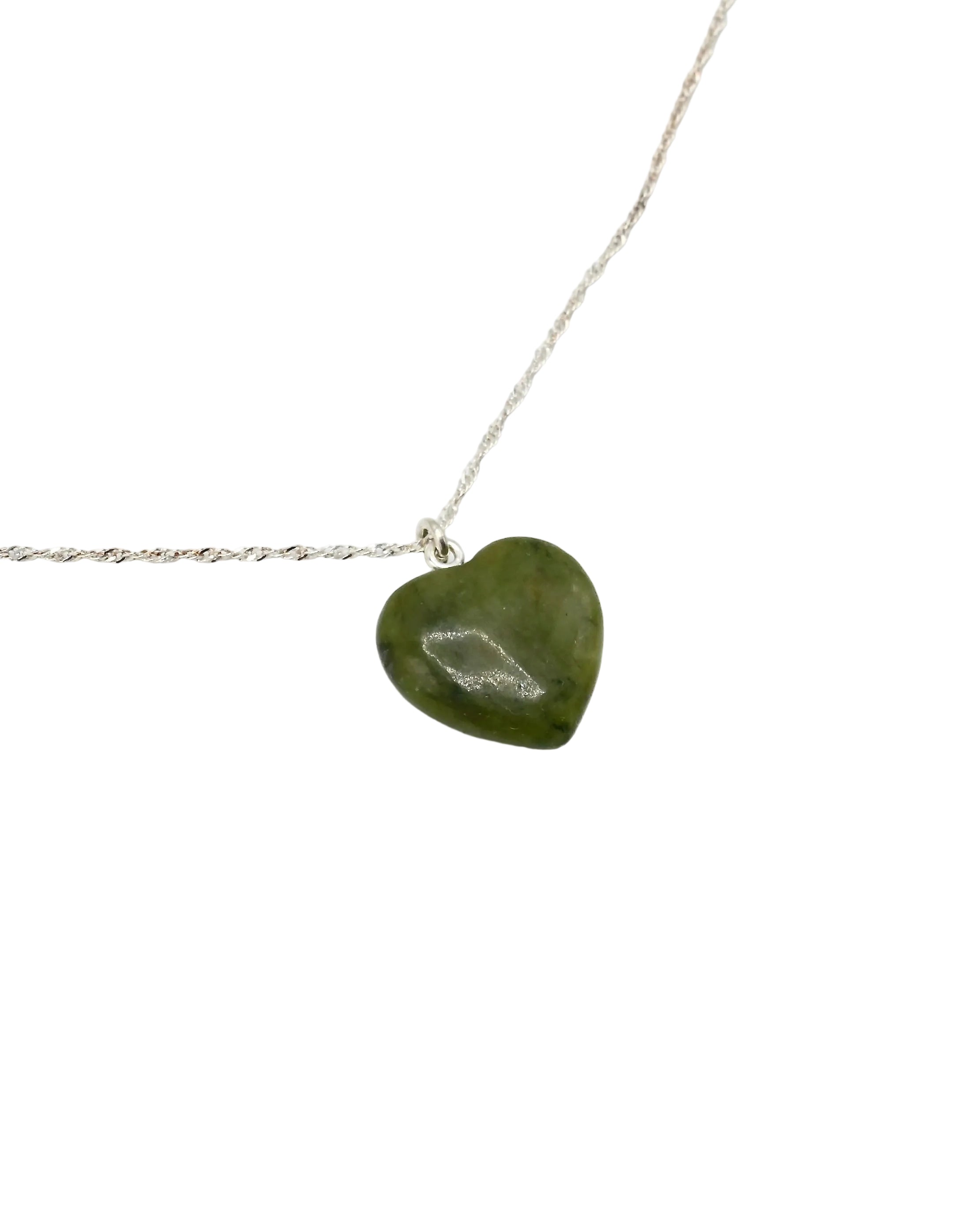 A silver chain necklace featuring a polished, heart-shaped green stone pendant, displayed on a clean white background.